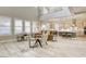 Bright living area showcasing an open layout, tall windows with shutters, and seamless flow to the kitchen at 2737 Josephine Dr, Henderson, NV 89044