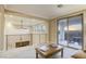 Open loft with a ceiling fan, balcony access, and views of the mountains at 2737 Josephine Dr, Henderson, NV 89044