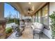 Inviting covered patio with ceiling fans, comfortable seating, and views of the landscaped backyard at 2737 Josephine Dr, Henderson, NV 89044