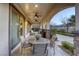 Relaxing covered patio with outdoor seating and beautiful landscaping at 2737 Josephine Dr, Henderson, NV 89044