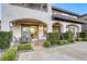 Charming covered patio for outdoor dining and relaxing, adjacent to the well-maintained yard at 2737 Josephine Dr, Henderson, NV 89044