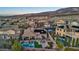An aerial view of the neighborhood highlighting desert landscaping, pools, and surrounding desert mountains at 2809 Proust Ct, Henderson, NV 89044