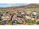A picturesque aerial view captures the beauty of a community, highlighting desert landscaping, and inviting homes at 2809 Proust Ct, Henderson, NV 89044