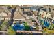 Experience outdoor living with a pool, patio, desert landscaping, and inviting home in this scenic aerial view at 2809 Proust Ct, Henderson, NV 89044