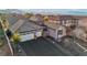 Aerial view showcases this home's three-car garage, desert landscaping, and stunning mountain views at 2809 Proust Ct, Henderson, NV 89044