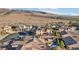 An aerial shot showcasing residences with desert landscaping, pools, and outdoor living spaces at 2809 Proust Ct, Henderson, NV 89044
