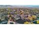 Experience community living with homes, landscaping, and neighborhood appeal in this captivating aerial view at 2809 Proust Ct, Henderson, NV 89044