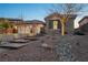 Inviting front exterior with a three-car garage, attractive landscaping, and decorative holiday lighting at 2809 Proust Ct, Henderson, NV 89044