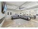 Open-concept living room featuring coffered ceilings, a fireplace, and a large sectional sofa at 2809 Proust Ct, Henderson, NV 89044
