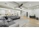 Open-concept living room with coffered ceilings and seamless flow into the gourmet kitchen at 2809 Proust Ct, Henderson, NV 89044