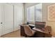 Office with natural light, a sewing station, built-in cabinets and hardwood floors at 2809 Proust Ct, Henderson, NV 89044