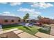 Beautiful backyard pool and outdoor lounge area for sunny relaxation and entertainment at 2809 Proust Ct, Henderson, NV 89044
