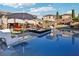 Inviting pool with sun loungers, umbrellas, and a built-in spa, perfect for relaxation and leisure at 2809 Proust Ct, Henderson, NV 89044