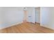 Bedroom featuring wood-look flooring, a closet, and an ensuite bathroom at 2878 El Cajon St, Las Vegas, NV 89169