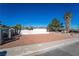 Single-story home featuring minimalist landscaping, and desert-friendly rock ground cover at 2878 El Cajon St, Las Vegas, NV 89169