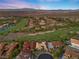 A charming community nestled within a golf course offers luxurious homes and serene views of the desert landscape at 3 Rue Allard Way, Henderson, NV 89011