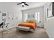 Well-lit bedroom featuring a full sized bed, shutters, modern decor, and neutral tones at 3 Rue Allard Way, Henderson, NV 89011