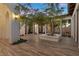 Open-air courtyard with an outdoor tree feature, tile flooring, and plenty of natural light at 3 Rue Allard Way, Henderson, NV 89011