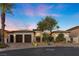 Charming single-story home with tile roof, three-car garage, desert landscaping, and a brick paved driveway at 3 Rue Allard Way, Henderson, NV 89011