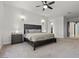 Neutral color palette in this main bedroom with carpet and minimalist decor at 3 Rue Allard Way, Henderson, NV 89011