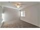 This bedroom features a ceiling fan, neutral walls, and soft carpeting at 3408 Winterhaven St # 204, Las Vegas, NV 89108