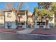 A bright condo building featuring covered parking and mature trees enhancing its curb appeal at 3408 Winterhaven St # 204, Las Vegas, NV 89108