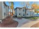 Well-maintained condo complex with a mix of drought-resistant landscaping and mature trees at 3408 Winterhaven St # 204, Las Vegas, NV 89108