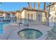 Inviting hot tub near the pool house with access steps, promising relaxation and community enjoyment at 3408 Winterhaven St # 204, Las Vegas, NV 89108