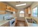 The bright kitchen includes essential appliances and ample cabinet space at 3408 Winterhaven St # 204, Las Vegas, NV 89108