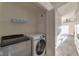 Laundry room with modern washer and dryer at 3408 Winterhaven St # 204, Las Vegas, NV 89108