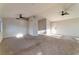 Large living room with multiple ceiling fans and ample natural light at 3408 Winterhaven St # 204, Las Vegas, NV 89108