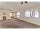 Inviting living room featuring carpet floors and a fireplace offers a comfortable and stylish space at 3408 Winterhaven St # 204, Las Vegas, NV 89108