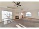 Spacious living room with fireplace and sliding door, perfect for relaxation and entertaining at 3408 Winterhaven St # 204, Las Vegas, NV 89108