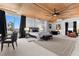 Bright bedroom boasts city views, stylish decor, and a comfortable seating area at 360 E Desert Inn Rd # 1903, Las Vegas, NV 89109