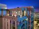 Luxury penthouse exterior view showcasing unique architectural features and expansive balcony at 360 E Desert Inn Rd # 1903, Las Vegas, NV 89109