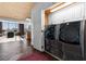 Convenient laundry room with modern washer and dryer units, adjacent to an open living space at 360 E Desert Inn Rd # 1903, Las Vegas, NV 89109