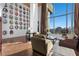 Bright living room featuring floor to ceiling windows with cityscape views at 360 E Desert Inn Rd # 1903, Las Vegas, NV 89109
