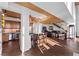 Open layout with a kitchen, bar seating, and living area with stairs, creating a spacious and social living space at 360 E Desert Inn Rd # 1903, Las Vegas, NV 89109