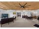 Spacious living area, showcasing the stylish furnishings, artwork, and unique ceiling design at 360 E Desert Inn Rd # 1903, Las Vegas, NV 89109