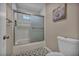 Well-lit bathroom with a shower and a toilet at 3731 Spencer St, Las Vegas, NV 89119