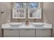 Elegant bathroom featuring double sinks, modern fixtures, and ample counter space at 3731 Spencer St, Las Vegas, NV 89119