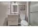 Bathroom boasts modern vanity, stylish mirror, and tile flooring at 3731 Spencer St, Las Vegas, NV 89119