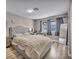 Comfortable bedroom featuring a plush bed, natural light, and modern furnishings at 3731 Spencer St, Las Vegas, NV 89119