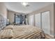 Bright bedroom featuring a king bed and ample storage at 3731 Spencer St, Las Vegas, NV 89119