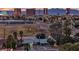 Distant cityscape view showcases nearby local mountains, buildings, trees, and greenery in the neighborhood at 3731 Spencer St, Las Vegas, NV 89119
