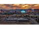A vibrant cityscape view with city buildings, clear skies, and distant mountains at sunset at 3731 Spencer St, Las Vegas, NV 89119