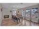 Dining Room with hardwood floors, fireplace, and many windows at 3731 Spencer St, Las Vegas, NV 89119