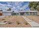 Charming single-story home with xeriscaped front yard and concrete walkway, perfect for low-maintenance living at 3731 Spencer St, Las Vegas, NV 89119