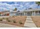 Charming one-story home with desert landscaping and a two-car garage at 3731 Spencer St, Las Vegas, NV 89119