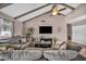 Cozy living room featuring vaulted ceilings, wood beams, and stylish decor at 3731 Spencer St, Las Vegas, NV 89119